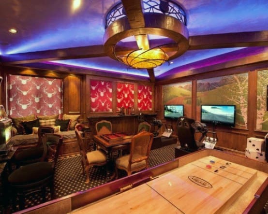 man cave game room with art gallery wall