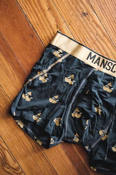 Manscaped Boxer 2.0 gold band with black fabric and gold print