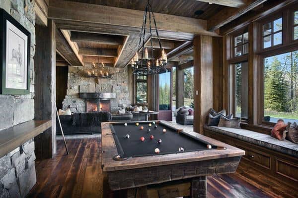 basement game room with billiards, lounge area and fireplace