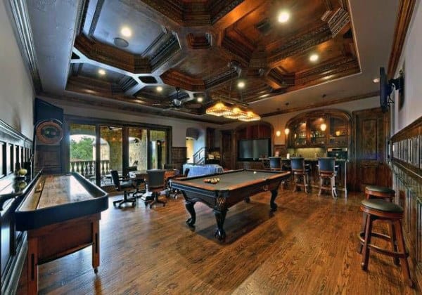 basement game room with billiards, table hockey, and wet bar